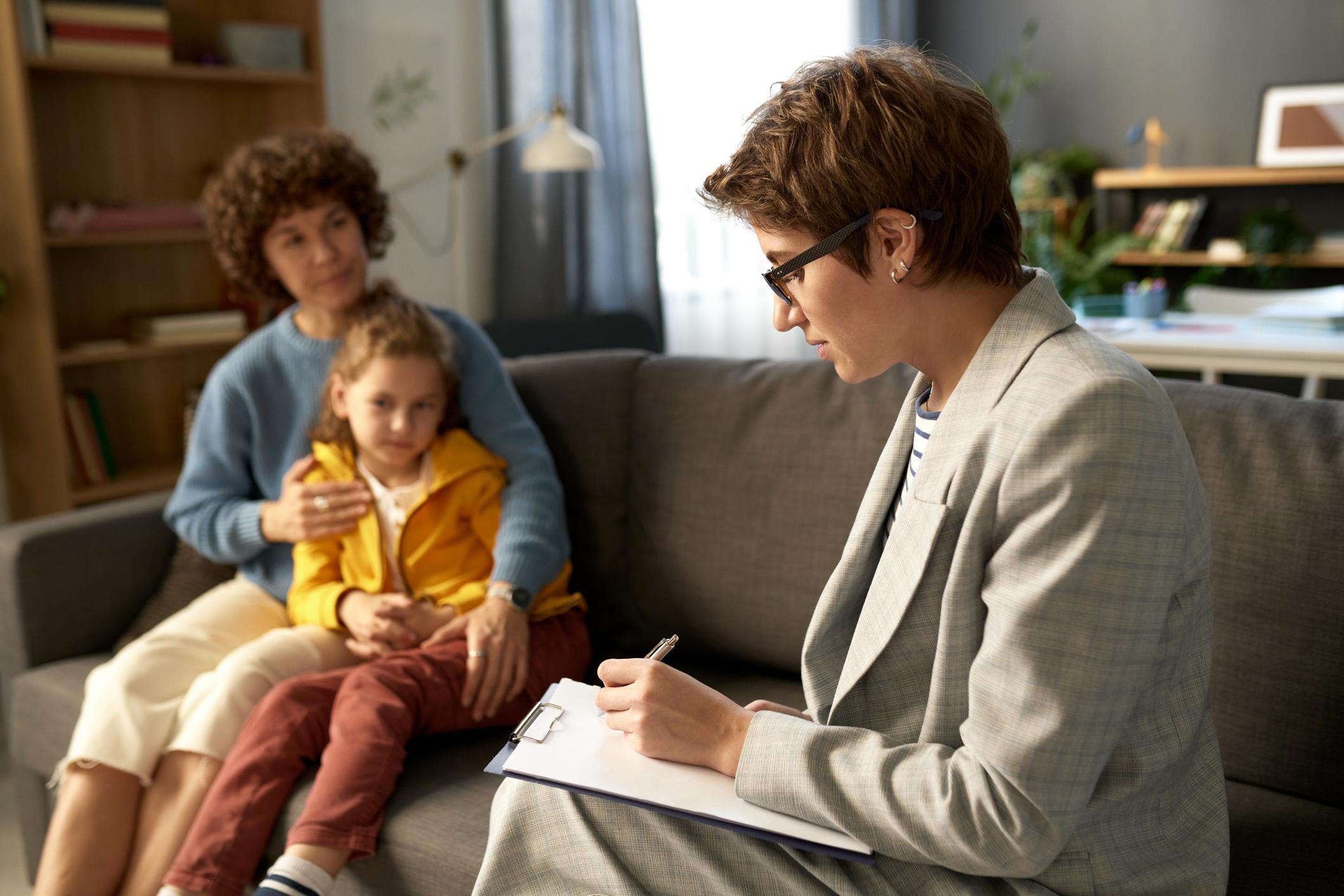 therapist talking to a couple